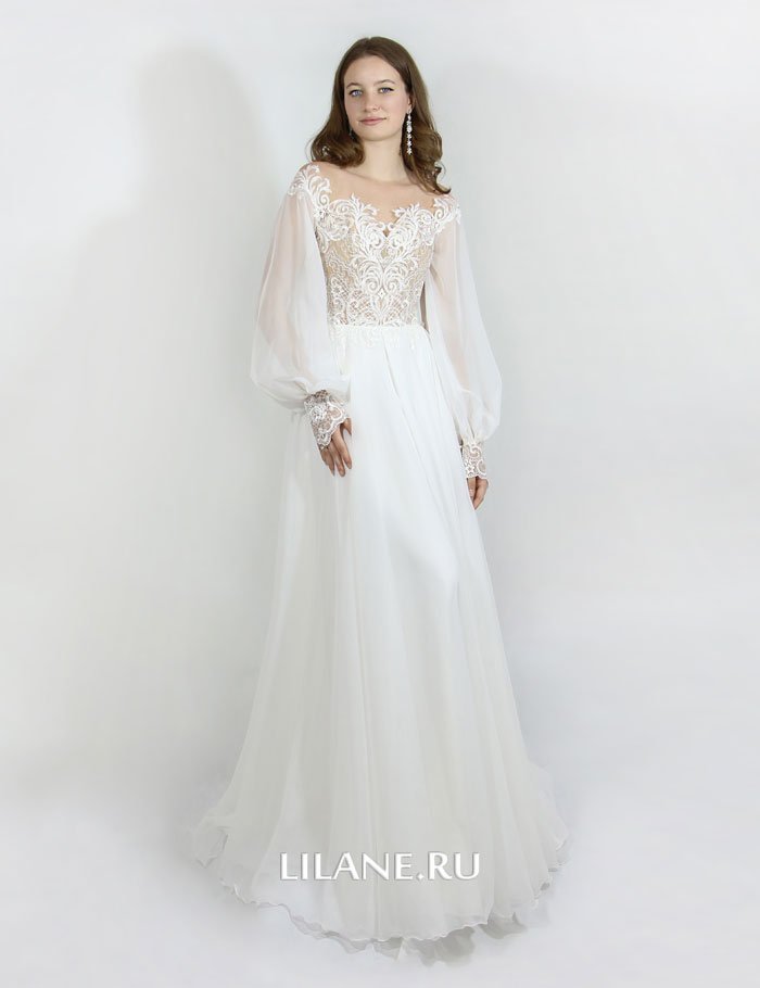 Прямое кружевное свадебное платье Avgustina цвета айвори со скрытым корсетом и пышными рукавами.